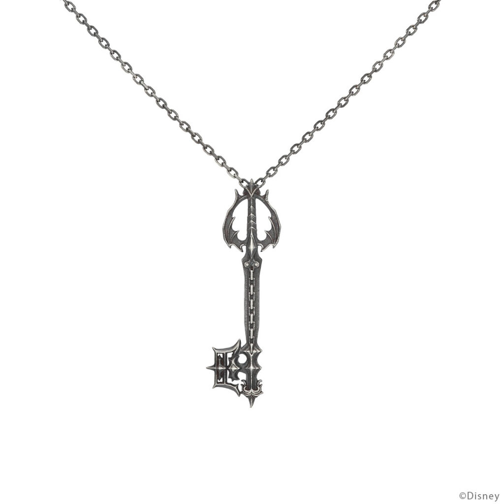 The product title translates to: "Keyblade 'Forgotten Memories' Necklace Silver 'Kingdom Hearts' | U-TREASURE